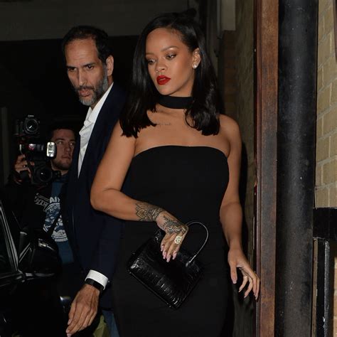 Rihanna in black dress